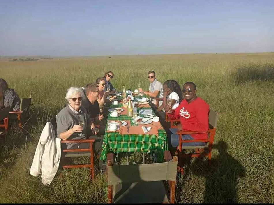Group enjoying a bush breakfast in the Maasai Mara
