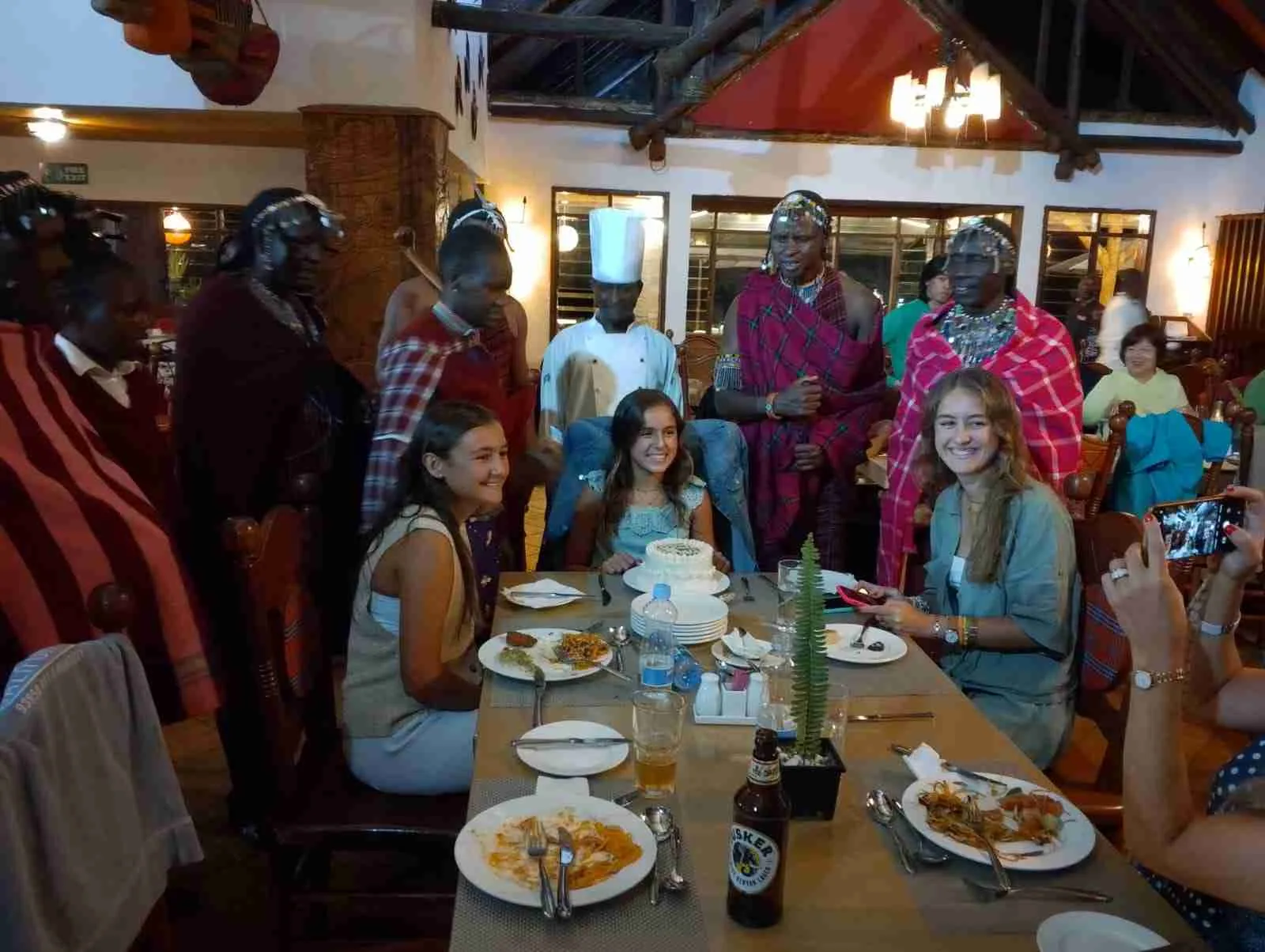 Maasai dancers performing at a lodge dinner celebration